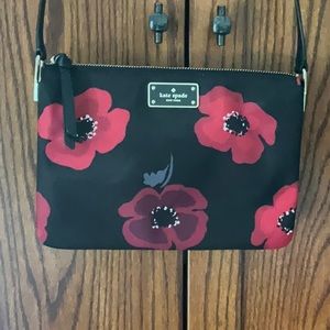 Never used Kate Spade black nylon/red poppy print crossbody